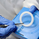 A health worker at the Wits Reproductive Health and HIV Institute (WRHI) in Johannesburg, South Africa showing off a Dapivirine vaginal ring that would be used in an HIV prevention trial on July 20, 2012